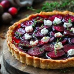 Delicious Cranberry Tart with roasted beets on a decorative plate