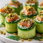 Cucumber Sushi Rolls filled with feta cheese and salmon crunch on a plate