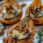 Elegant blue cheese stuffed pears served as an appetizer on a platter.