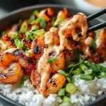 Hawaiian shrimp poke bowl with Sriracha mayo and fresh ingredients