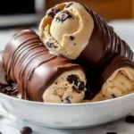 Bowl of homemade coffee ice cream served with coffee beans on top