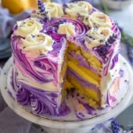 Lavender Lemon Cream Cake with White Chocolate Frosting on a decorative plate