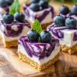 No-bake blueberry cheesecake bites topped with fresh blueberries