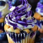 No-bake blueberry vanilla cheesecake cupcakes topped with fresh blueberries