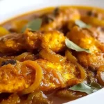 Delicious pickled fish served with caramelized onions for a unique taste