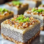 No-bake chia pudding bars with coconut lime flavor on a wooden table.