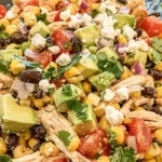 Colorful Southwest Chicken Salad with grilled chicken, avocados, and vegetables.